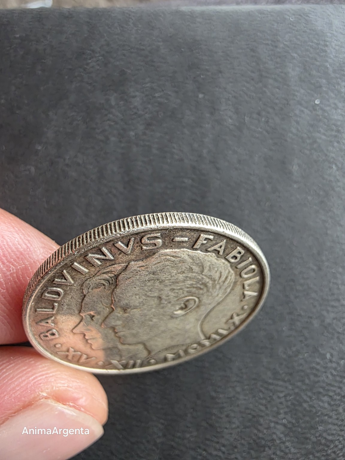 Canto estriado del ejemplar belga de 50 francos de 1960